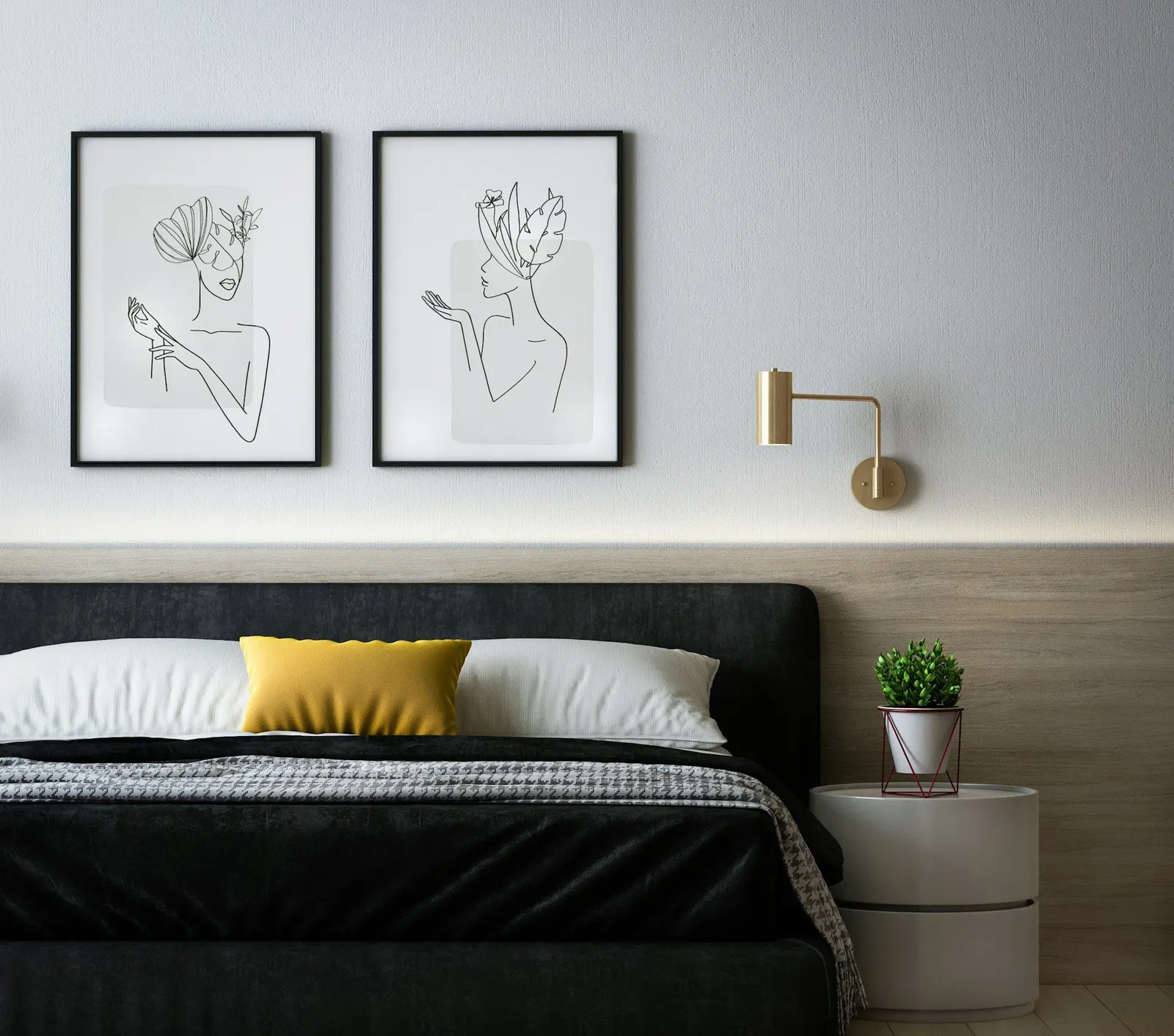 Rom med seng og kunst på veggen